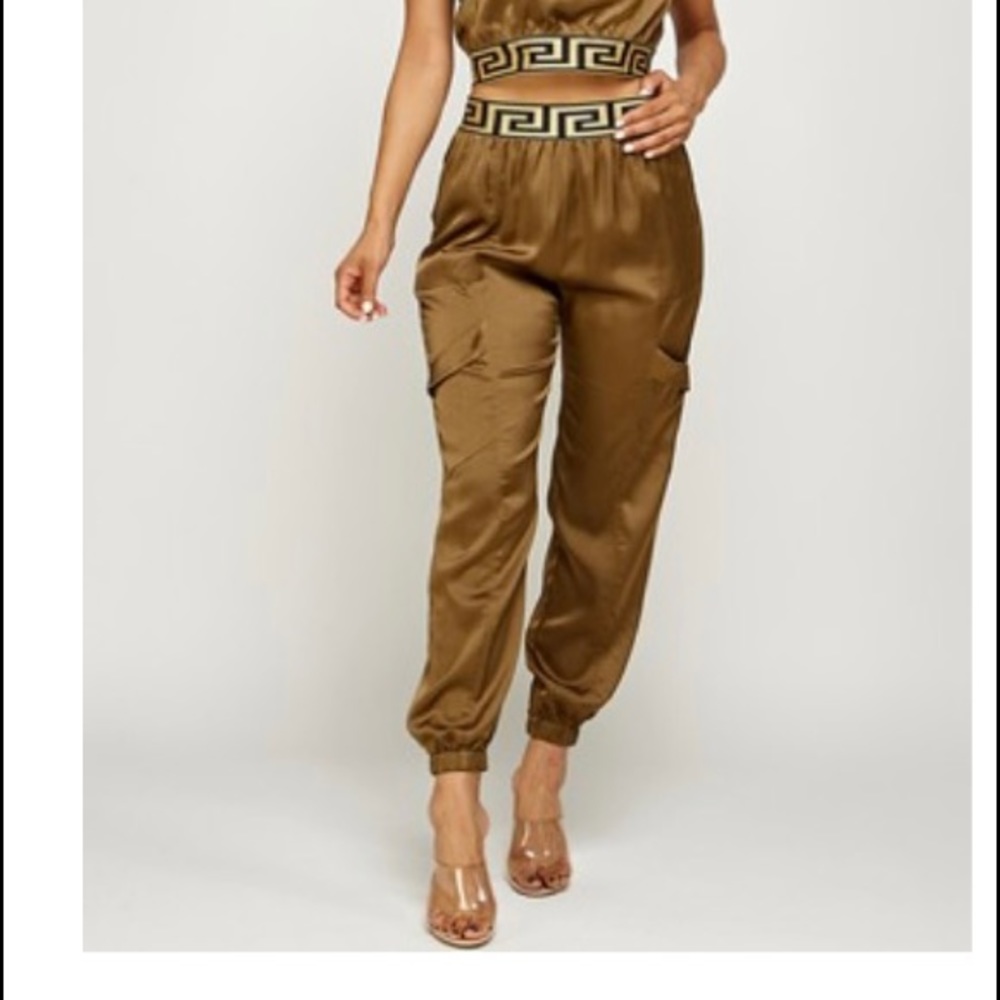 All I can say is WOW!  This is a show stopper. Satan 2 piece jumpsuit is must - Picture 2 of 4